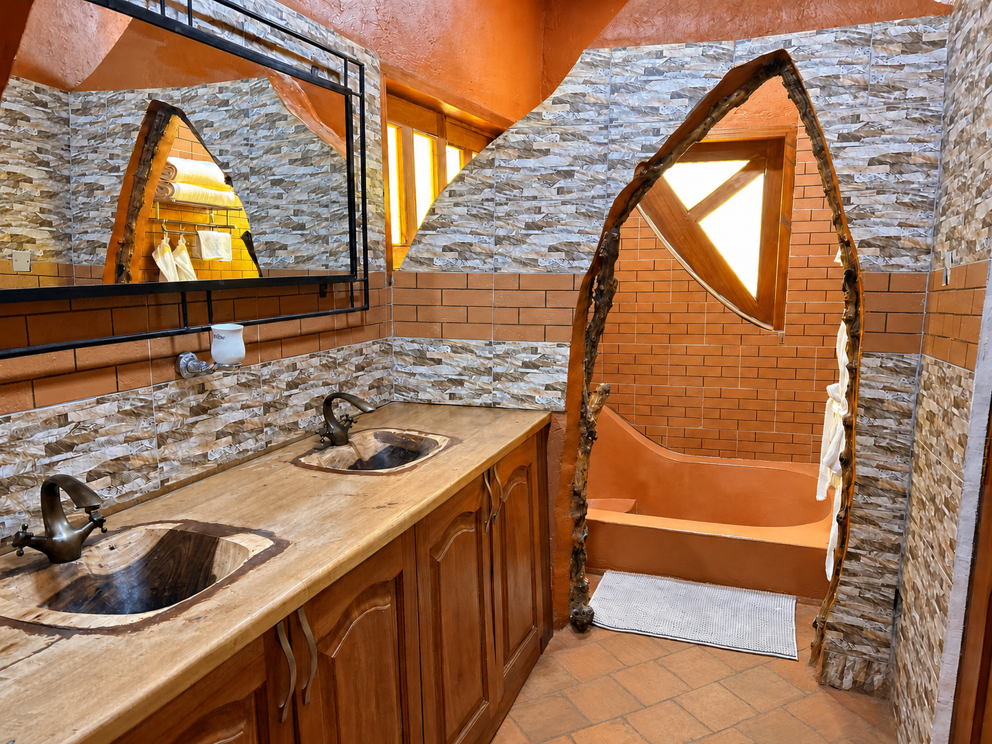 Karakara banda double vanity sinks with mirror at Warujojo Safari Lodge