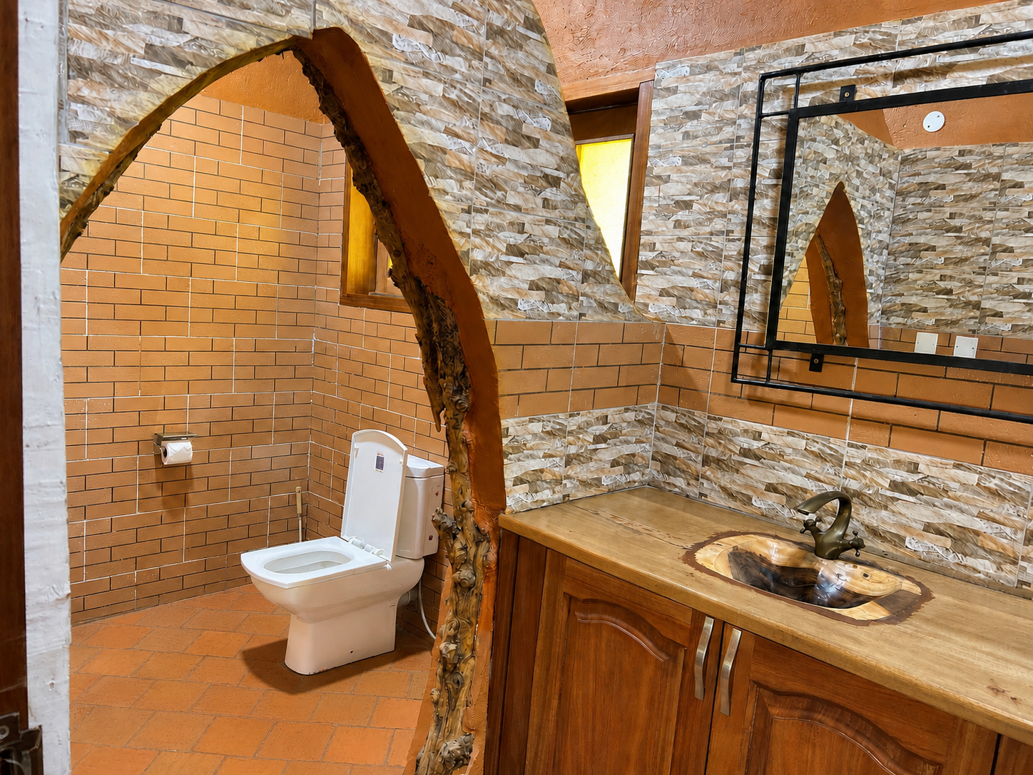 Karakara banda ensuite with double vanity and toilet at Warujojo Safari Lodge