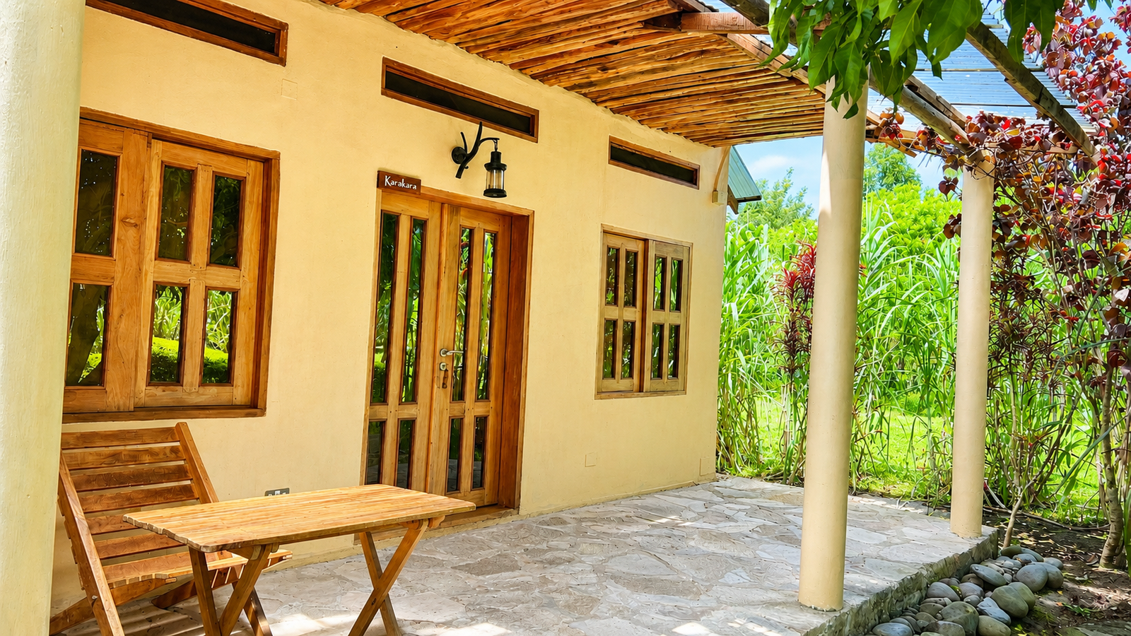 Karakara banda exterior veranda and entrance at Warujojo Safari Lodge