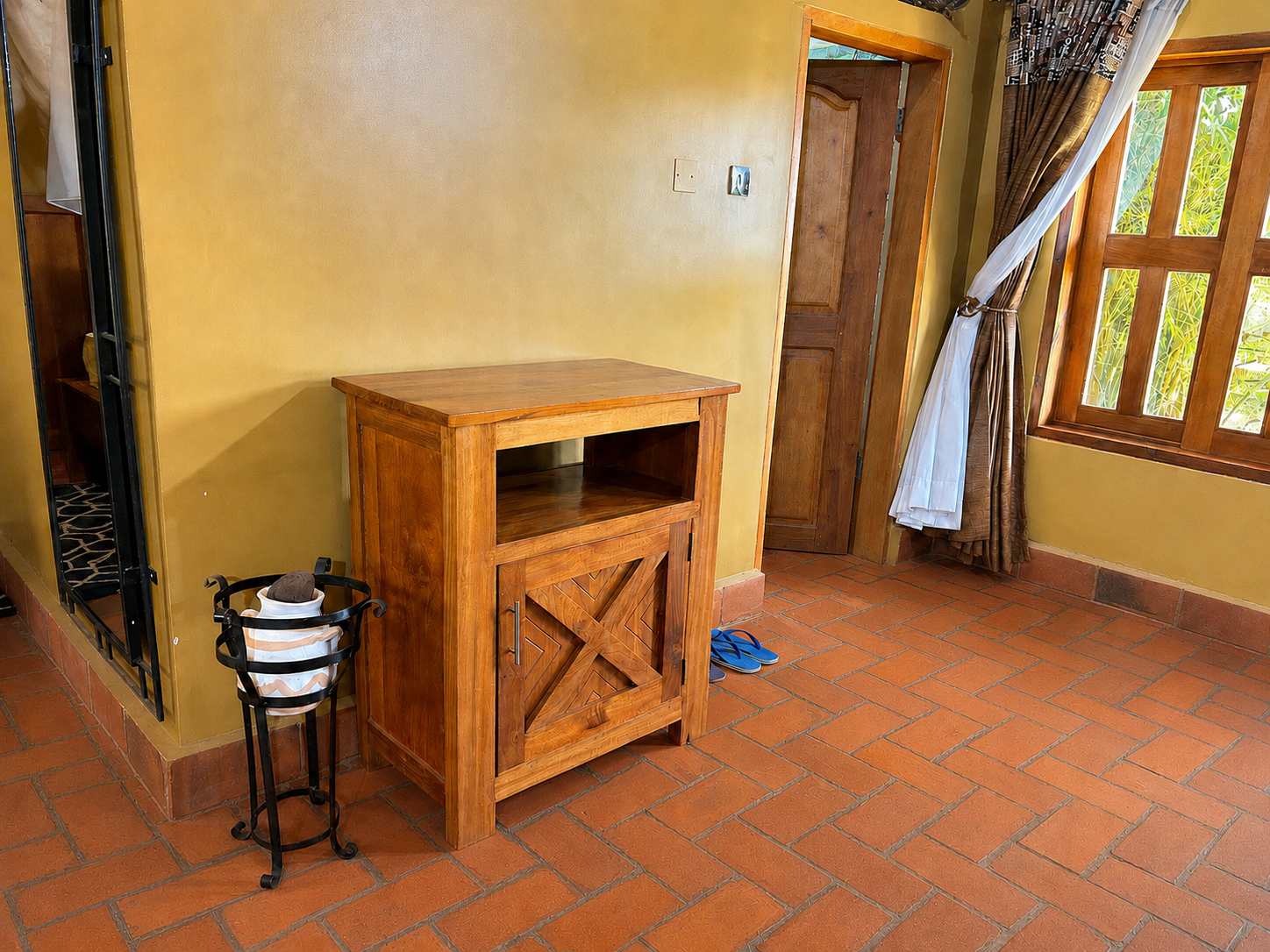 Rekemire banda wooden nightstand cabinet at Warujojo Safari Lodge
