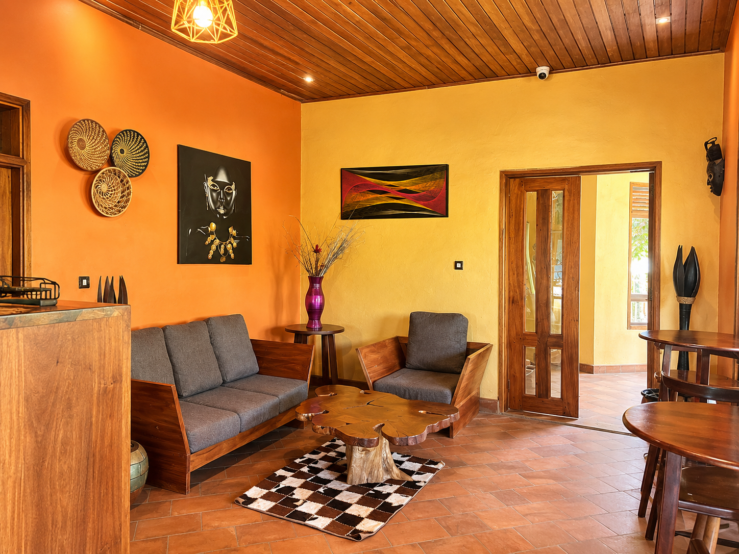 Armchair seating in the bar lounge at Warujojo Safari Lodge