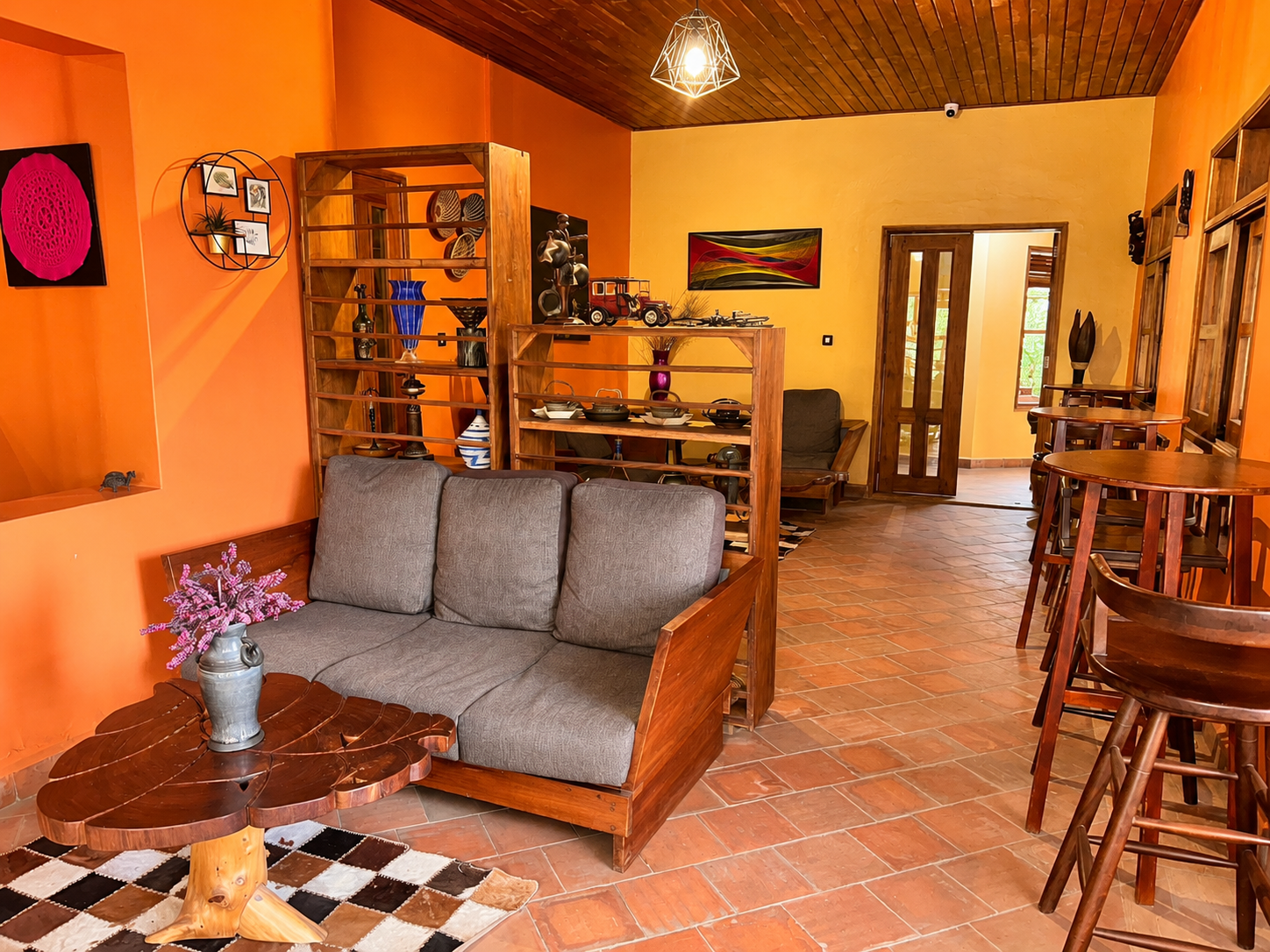 Lounge seating and bar stools at Warujojo Safari Lodge