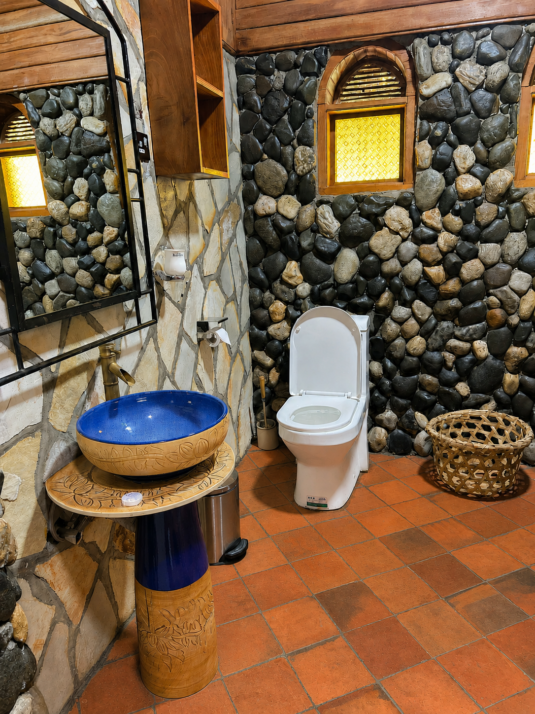 Amina cottage bathroom vanity with mirror at Warujojo Safari Lodge