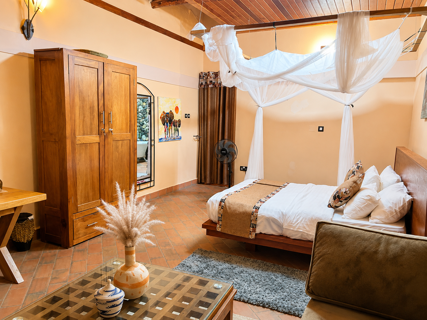 Amina cottage wardrobe and mirror in the bedroom at Warujojo Safari Lodge
