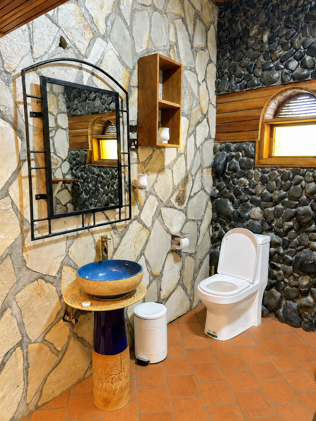 Hannibal cottage bathroom with sink, toilet and mirror at Warujojo Safari Lodge