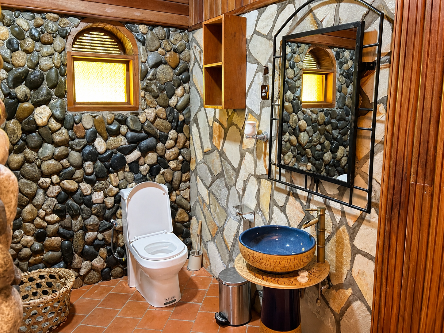 Menelik cottage bathroom with toilet, vanity and mirror at Warujojo Safari Lodge