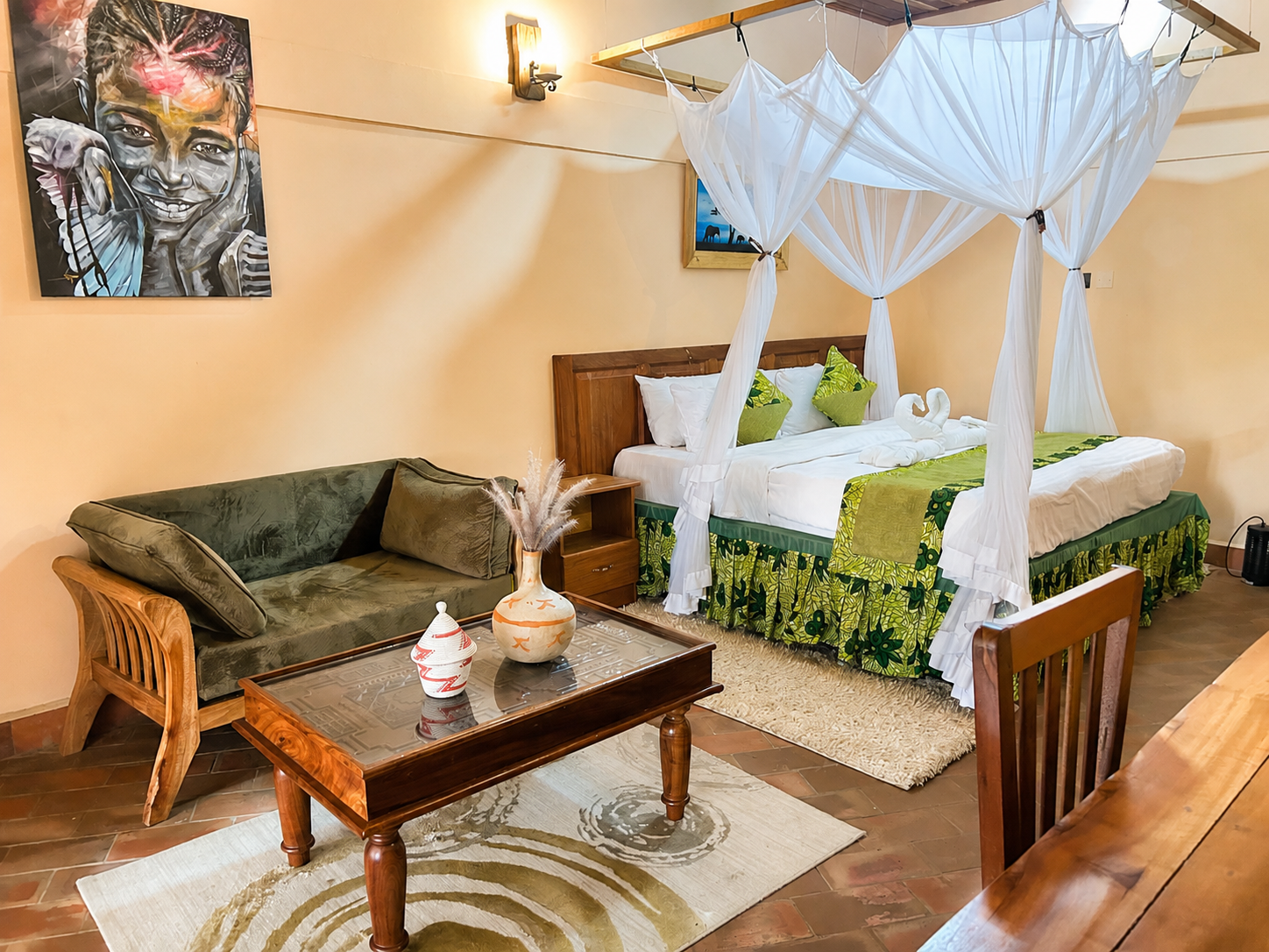 Menelik cottage bedroom and lounge overview at Warujojo Safari Lodge
