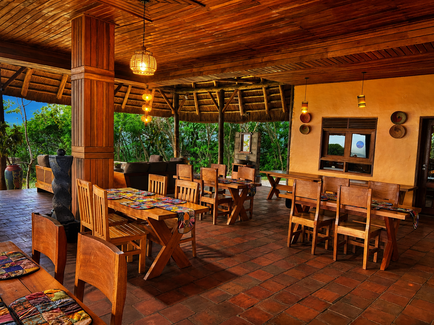 Dinner table at the edge of the open-air dining space, savanna beyond, Warujojo Safari Lodge