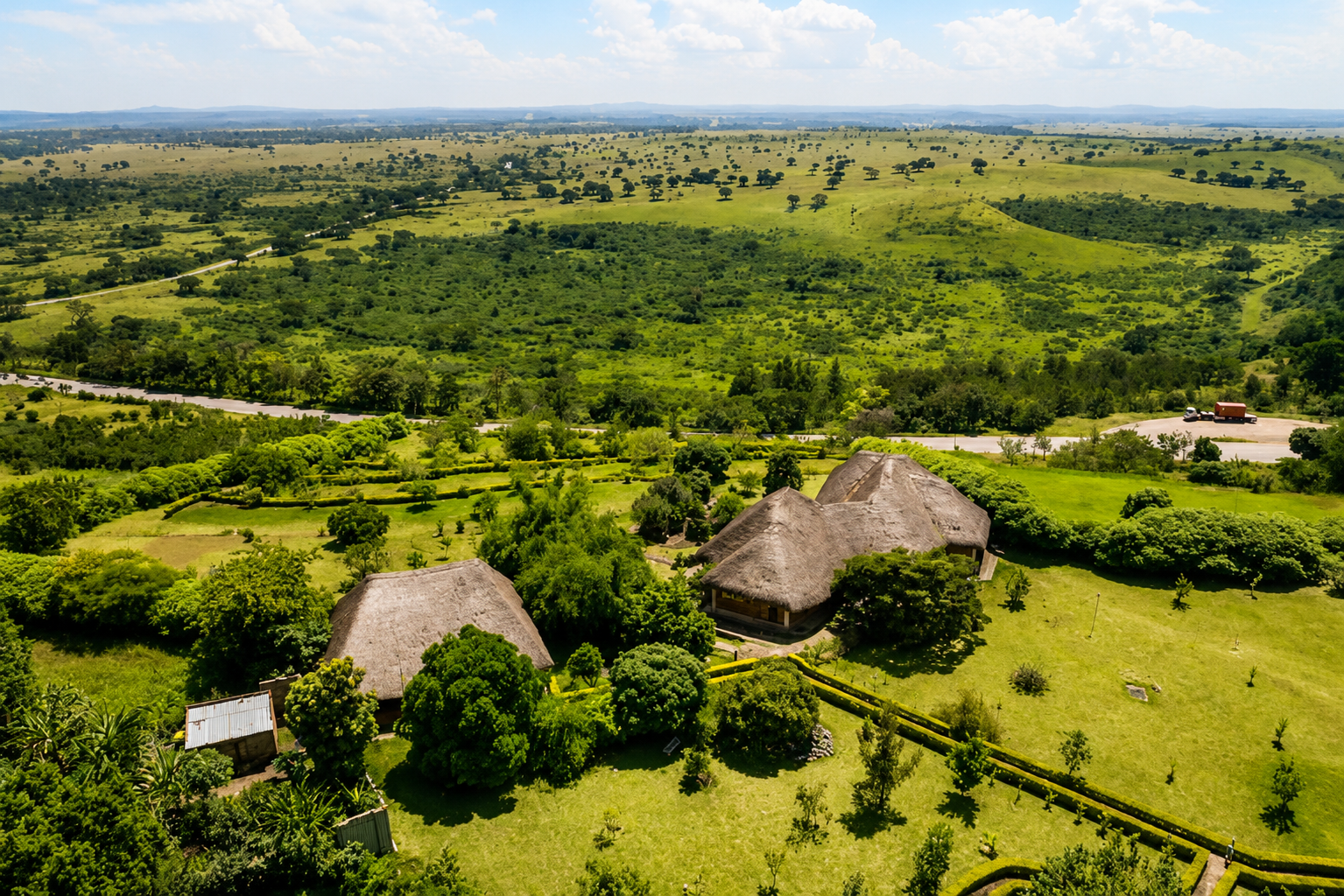 Aerial view over Warujojo Safari Lodge and the savanna of Queen Elizabeth National Park, Uganda