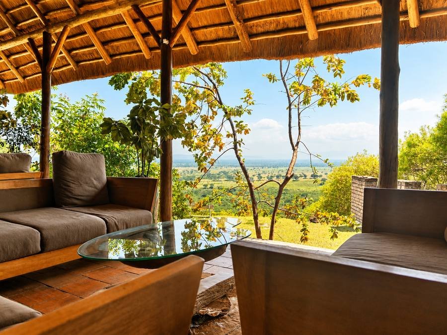 The savanna plains of Queen Elizabeth National Park seen from the lodge's open-air restaurant